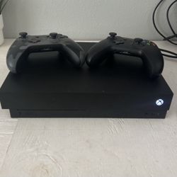 Xbox one X gaming console (Great condition)