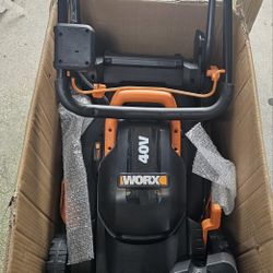 NEW PUSH LAWN MOWER ....14 INCHES....FOR SMALL YARDS....CHARGER, 2 BATTERIES AND SMALL VACUUM INCLUDED...NEW...$ 200