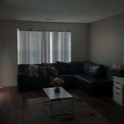 DARK GREY LEATHER SECTIONAL 