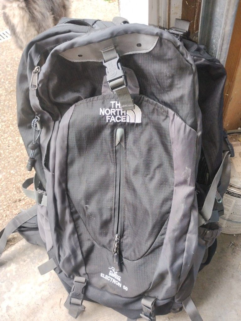 Hiking Backpack With Small Tear On The Seam.