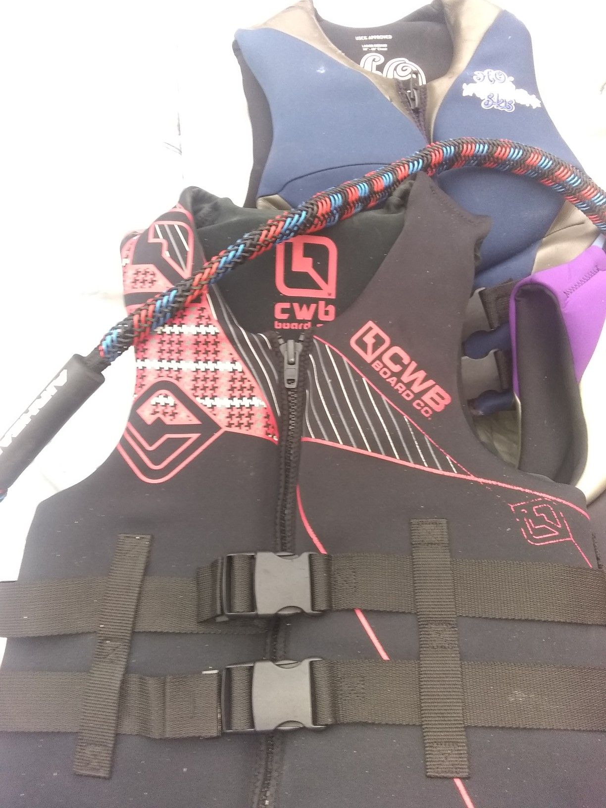 Like new life vests CWB boards HO skis DBX with tow ropes