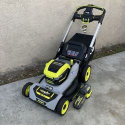 RYOBI 40V HP Brushless 21" Whisper Series Cordless Walk-Behind Multi-Blade Push Lawn Mower w/(2) 4.0 ah Batteries & Charger