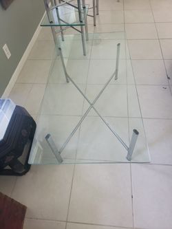 4 glass top tables, 2 coffee, and 2 side tables