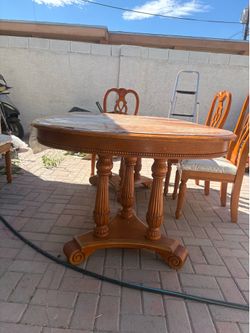 Heavy wood table and china cabinet