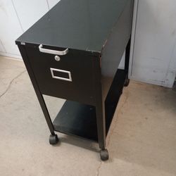 On Casters Metal File Cabinet $ 25  With Key 