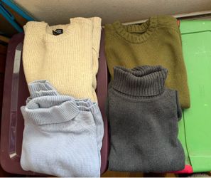 4 Women’s size medium sweaters
