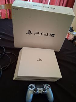 Sony Playstation 4 pro 1TB Glacer White  Console  comes w/ 1 Controller & all Cords needed also comes  with/  dose not come with  games adult  owned  