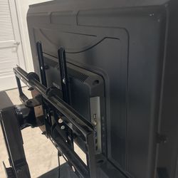 40 Inch TV , Tv Stand and Apple TV 