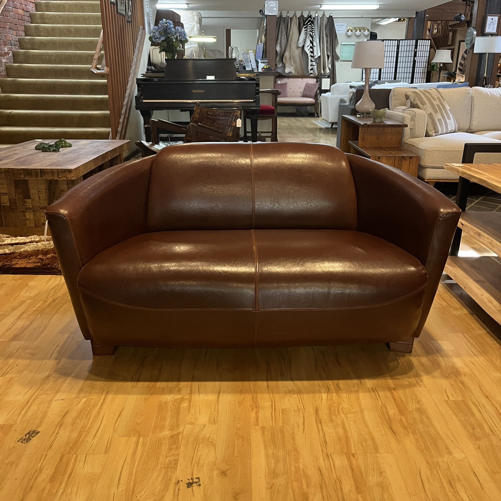 Curved Chocolate Leather Loveseat