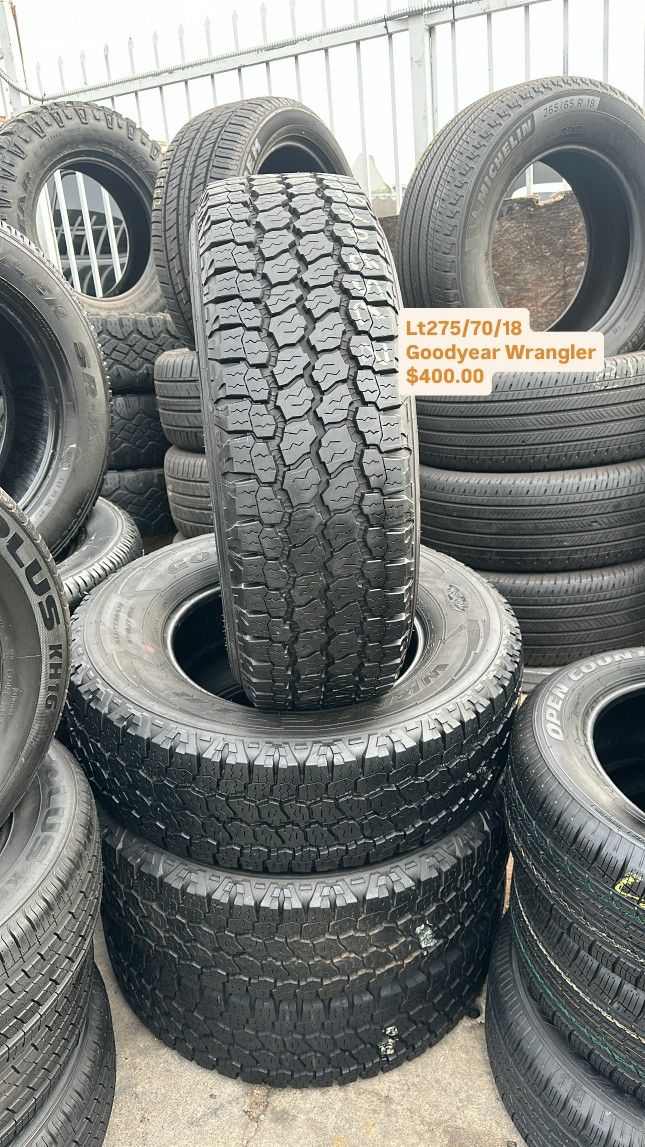 SET OF FOUR USED TIRES ALMOST NEW GOOD YEAR WRANGLER LT AT 275/70/18