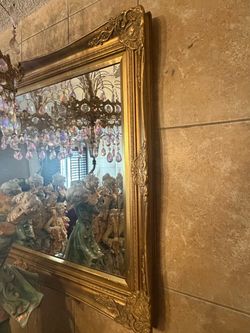 Beveled Mirror with Decorative Frame