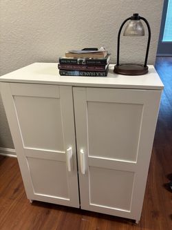 IKEA white cabinet with 3 shelf