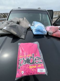 Bulk in Multiple sizes and colors of spider hoodies