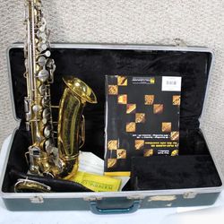 Bundy Alto Saxophone in original case with accessories