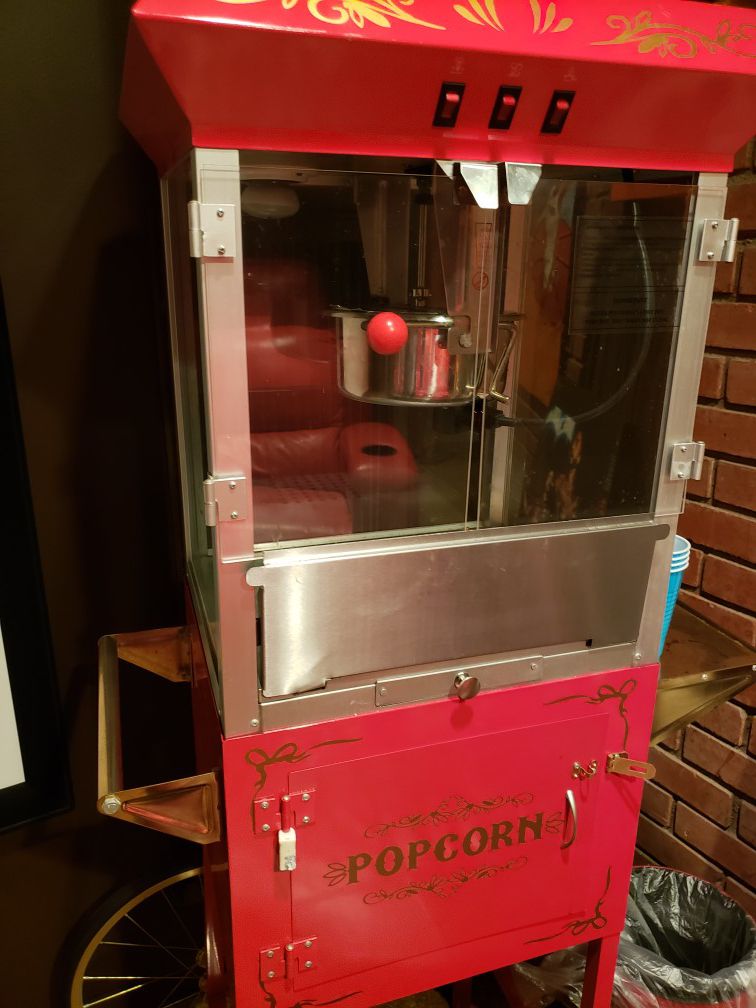 Antique popcorn machine with cart
