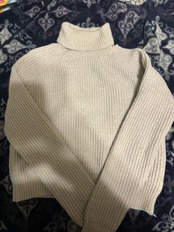 Off white knitted turtleneck sweater