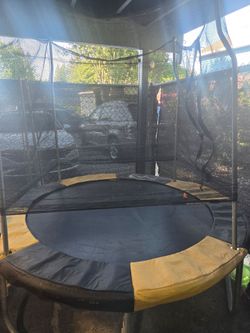 Trampoline with safety net.
