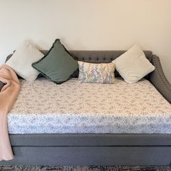 Gray convertable day bed with mattresses