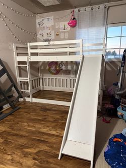 Twin bunk frame with slide