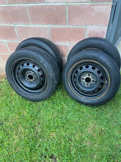 4 rims and tire.