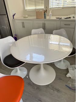 Mid century table and swivel chairs