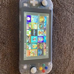 NINTENDO SWITCH LITE + 100 SWITCH GAMES INCLUDED