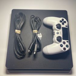 PlayStation 4, PS4 with 500GB of storage And Controller.