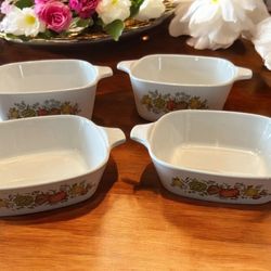 4 vintage Corning ware casserole dishes with Square shape and spice of life pattern.