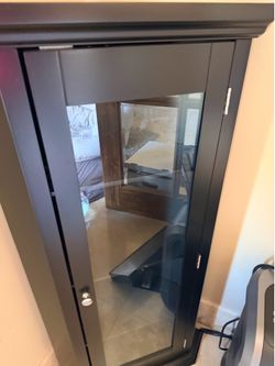 Glass corner cabinet like new