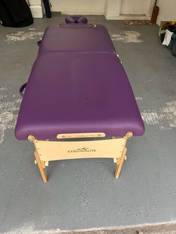 MASSAGE TABLE EARTHLITE/ WAS $395/ NOW ASKING $90