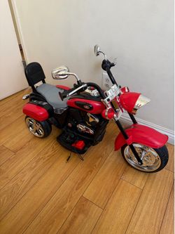 Battery powered ride on motorcycle