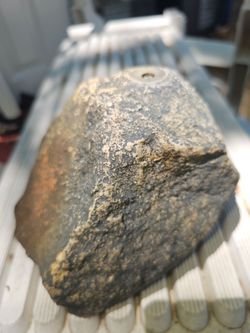 Prices firm.. fake rock lawn sprinkler