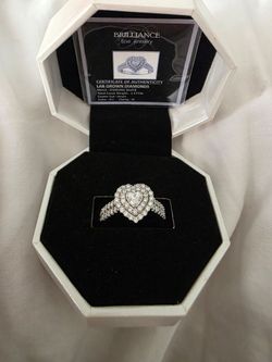 Engagement ring with heart center