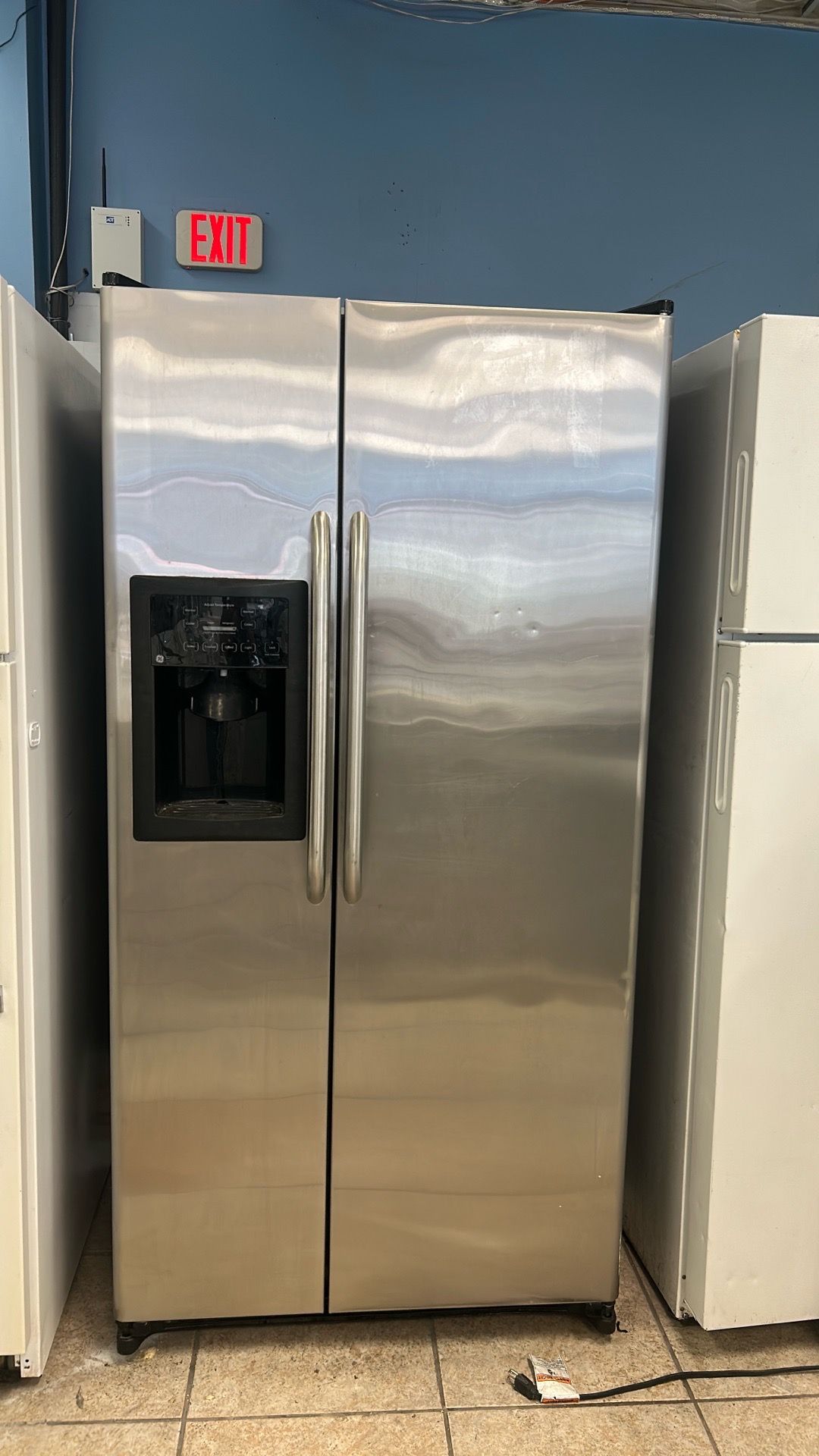 GE Stainless Steel Side-by-Side Refrigerator with Water and Ice Dispenser