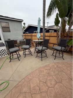 6 chairs with cushions. (Table optional)