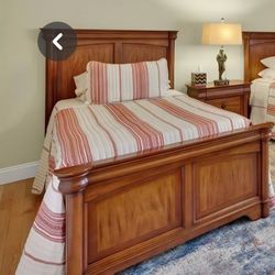Great condition Twin size bed with solid wood frame ,well kept includes spring base , mattress