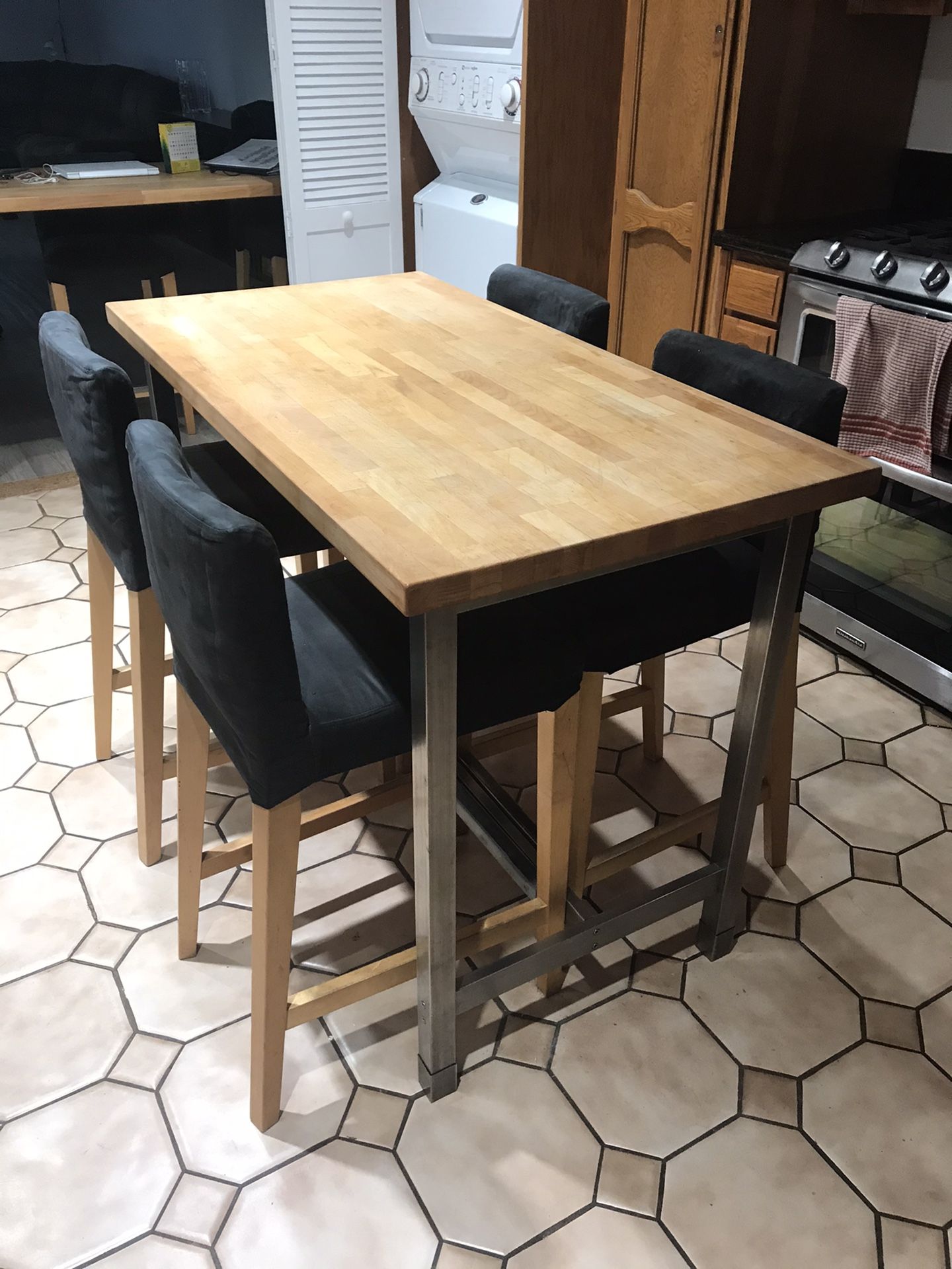 IKEA Butcher Block Kitchen Table Island Counter Height 35” Tall x 26” Depth x 49 1/2” Wide With 4 IKEA Counter Height Chairs. Seat Height 26”