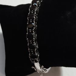 Sterling Jewelry.  Beautiful Sterling Bracelet with black stones. LIKE NEW.  