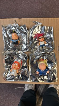 Kidrobot family guy series 2, cop Joe, prisonbreak meg, prom king Chris, and wedding dress lois