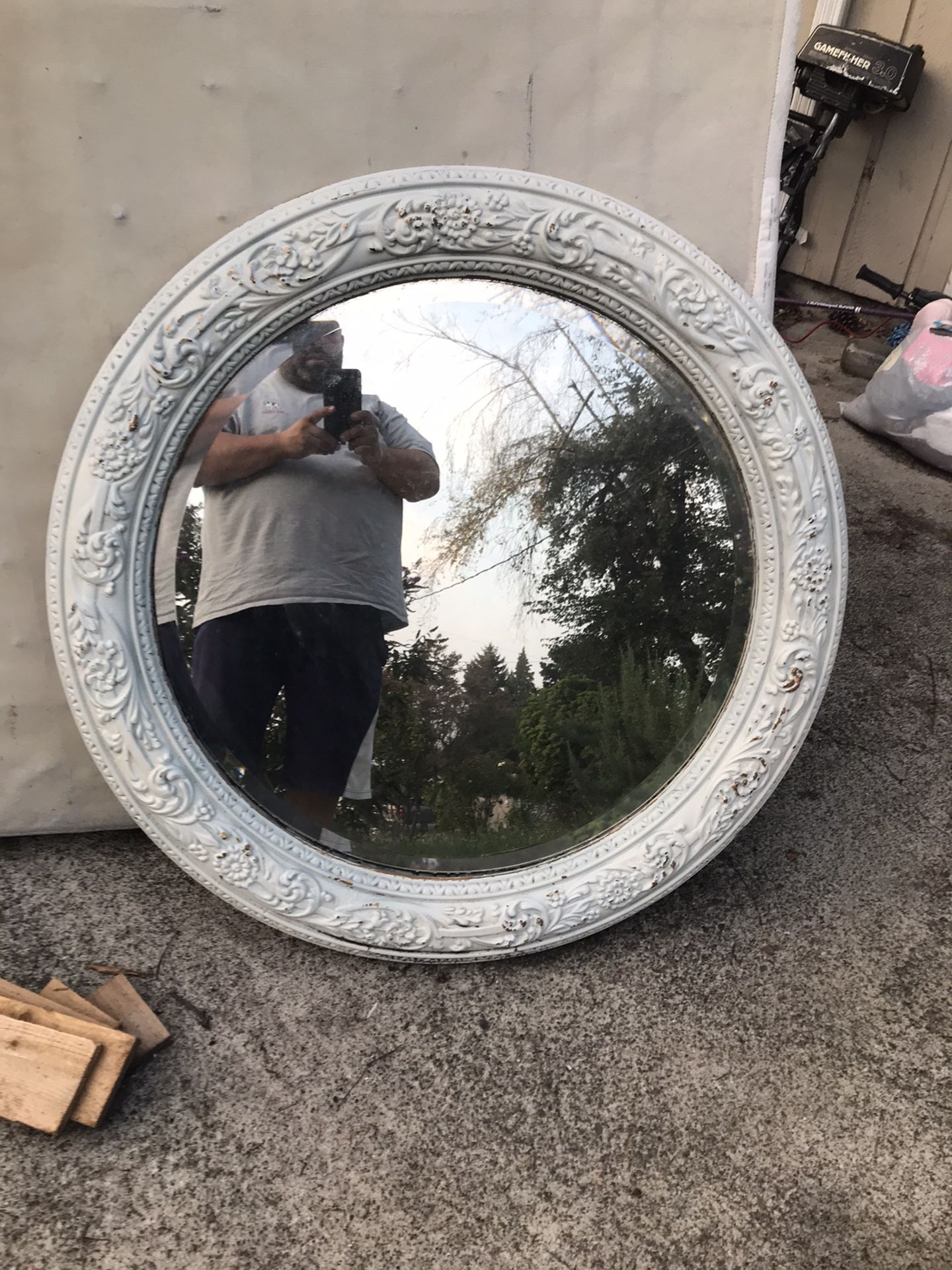 Oval glass mirror