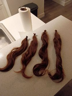 Real RED untreated,NaturalHuman hair extensions. Freshly cut Scottsdale