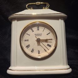 Porcelain clock made by Madison. Quartz driven.