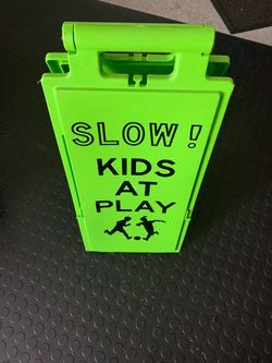 Kids at play road sign