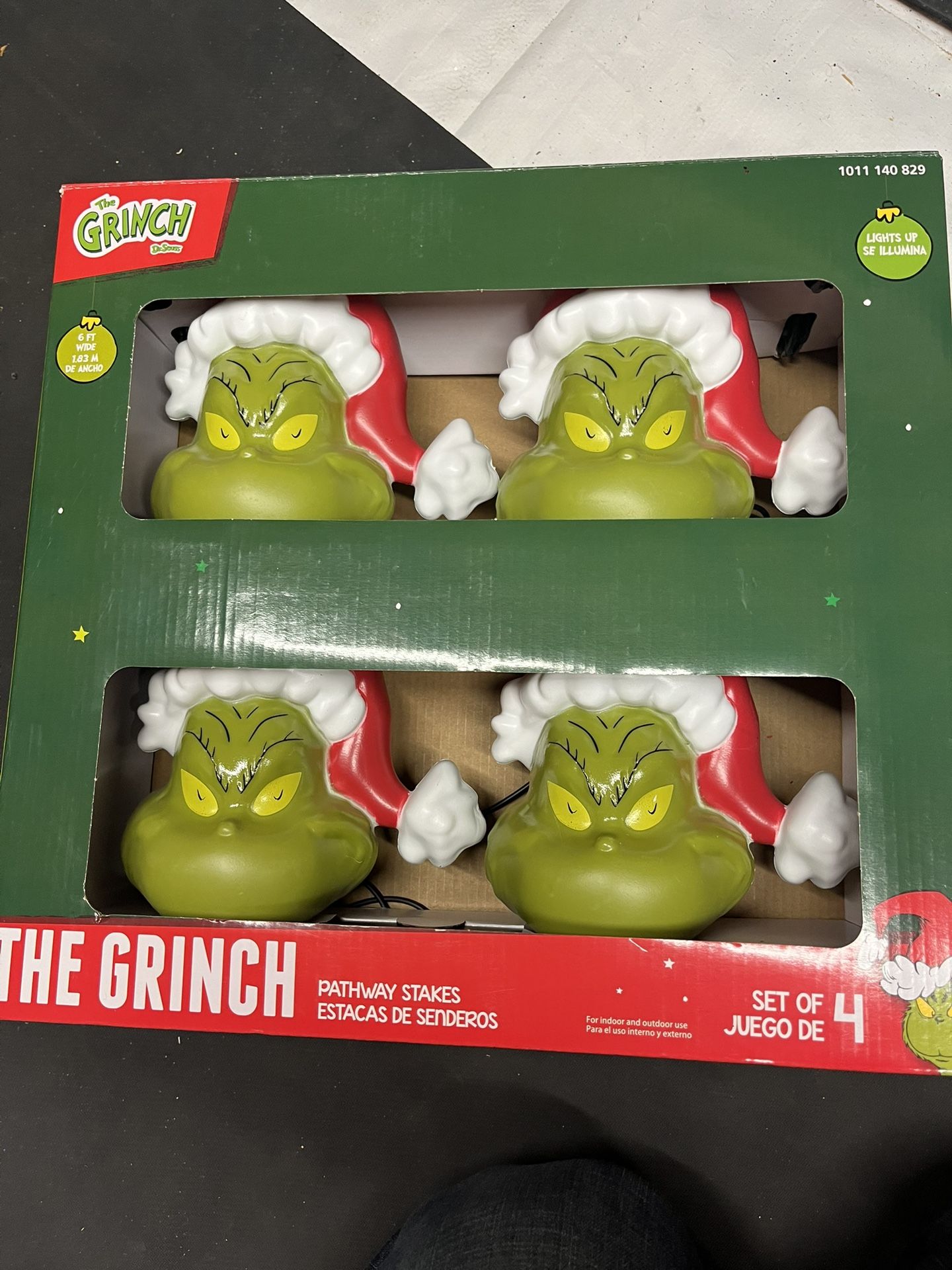 Gemmy Christmas Grinch Battery-Operated Pathway Stakes (4 Count) with Santa Hat LED lights