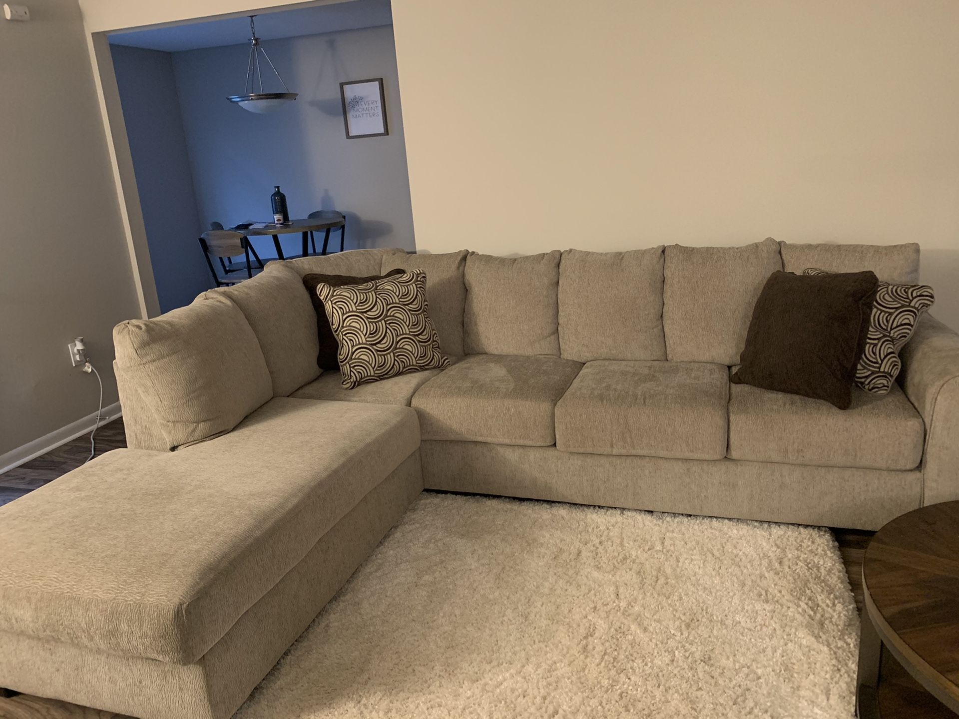 Light colored sectional. Fairly new, purchased in September