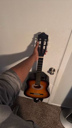 Wooden guitar (with strings)