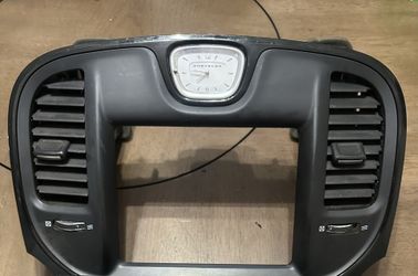 2015 Chrysler 300 OEM Dash Bezel w/ Clock & Air Vents