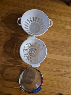 Plastic or metal strainer ($2- $5)