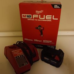 Brand new milwaukee drill battery and battery charger