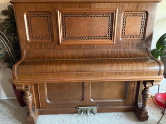Antique Upright Piano with Ornate Wood Carvings